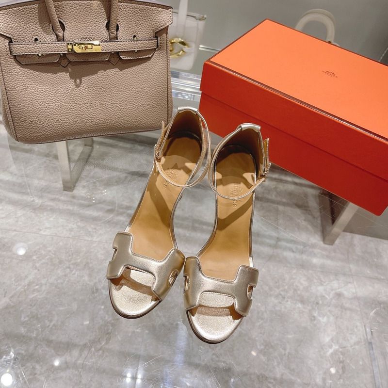 H**mes leather high heels in pale gold