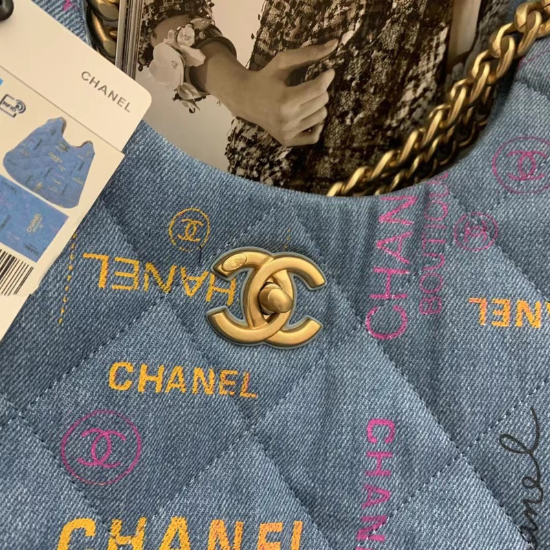 Ch*el maxi hobo bag printed denim & gold-tone metal blue & multicolor