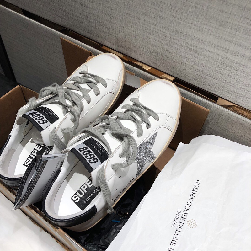 golden goose men’s S*per-star sneakers with silver star and black heel tab
