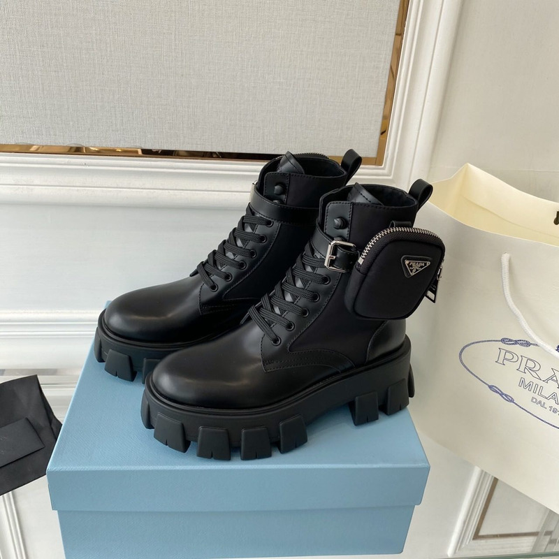 Pra*a monolith glossed leather and nylon short boots black