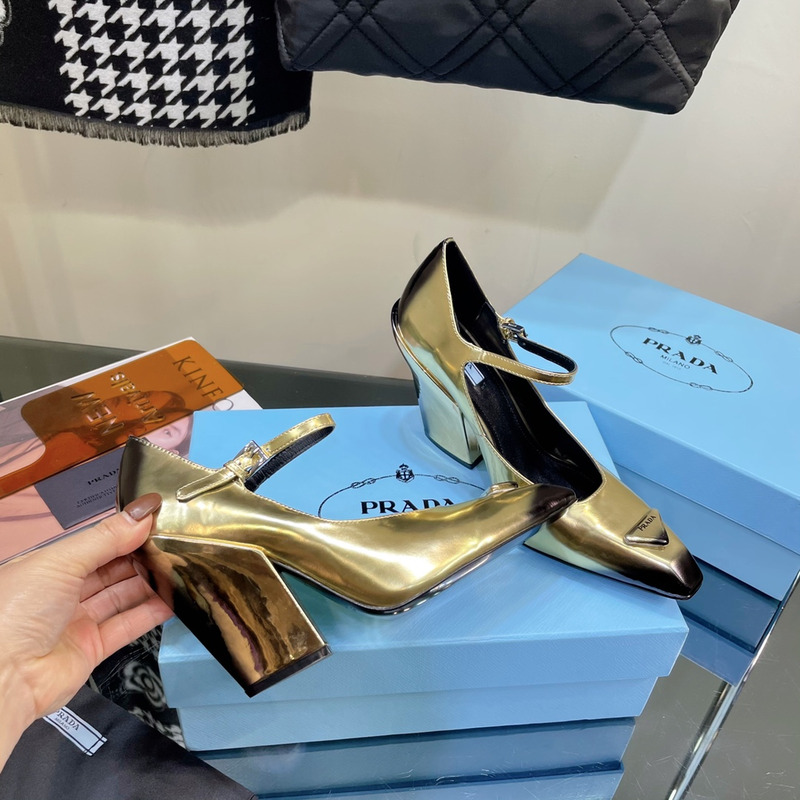 Pra*a glossed-leather pumps platinum