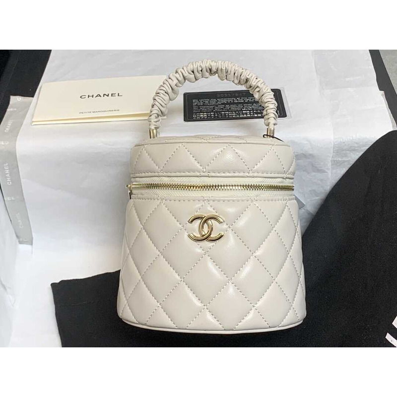 Ch*el mini top handle vanity case white shiny lambskin gold hardware