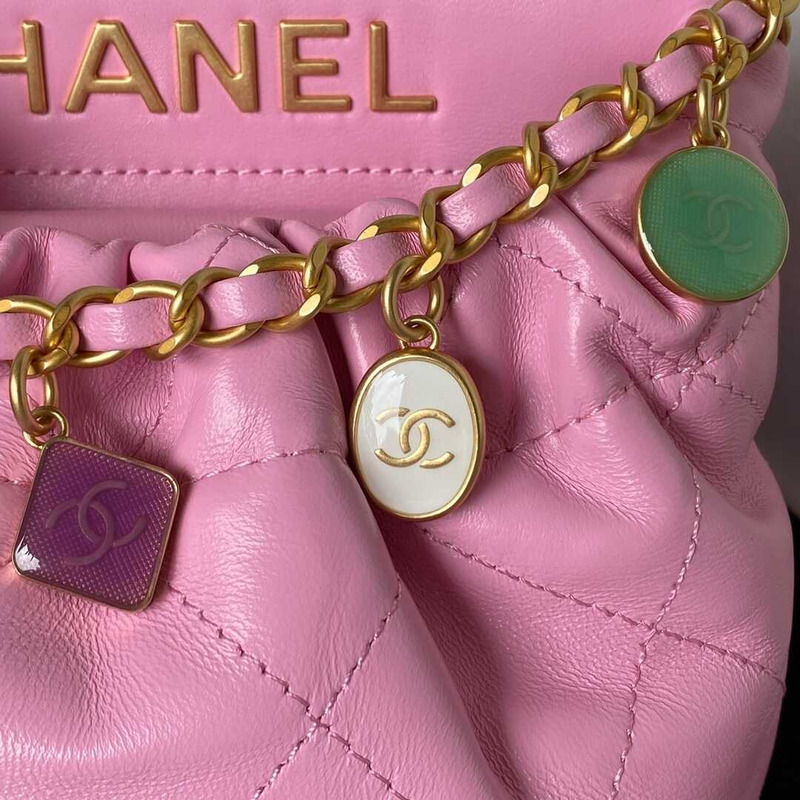 Ch*el small bucket bag lambskin resin & gold-tone metal pink