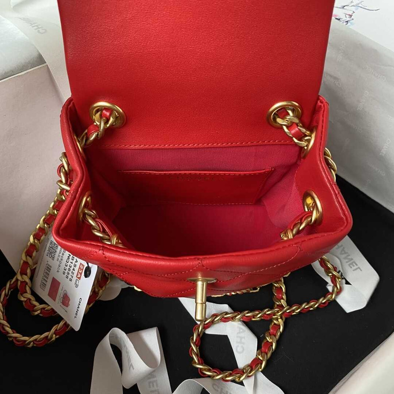 Ch*el small backpack calfskin & gold-tone metal red