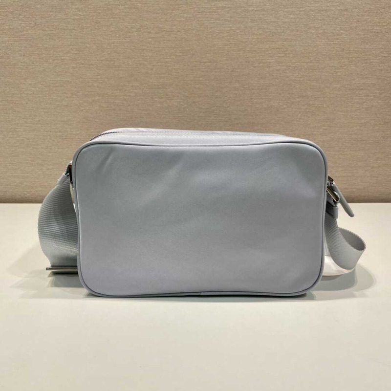 Pra*a logo plaque shoulder bag blue