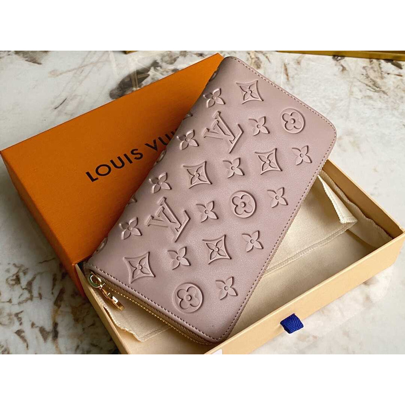 l**is V*t*n  zippy wallet nude pink