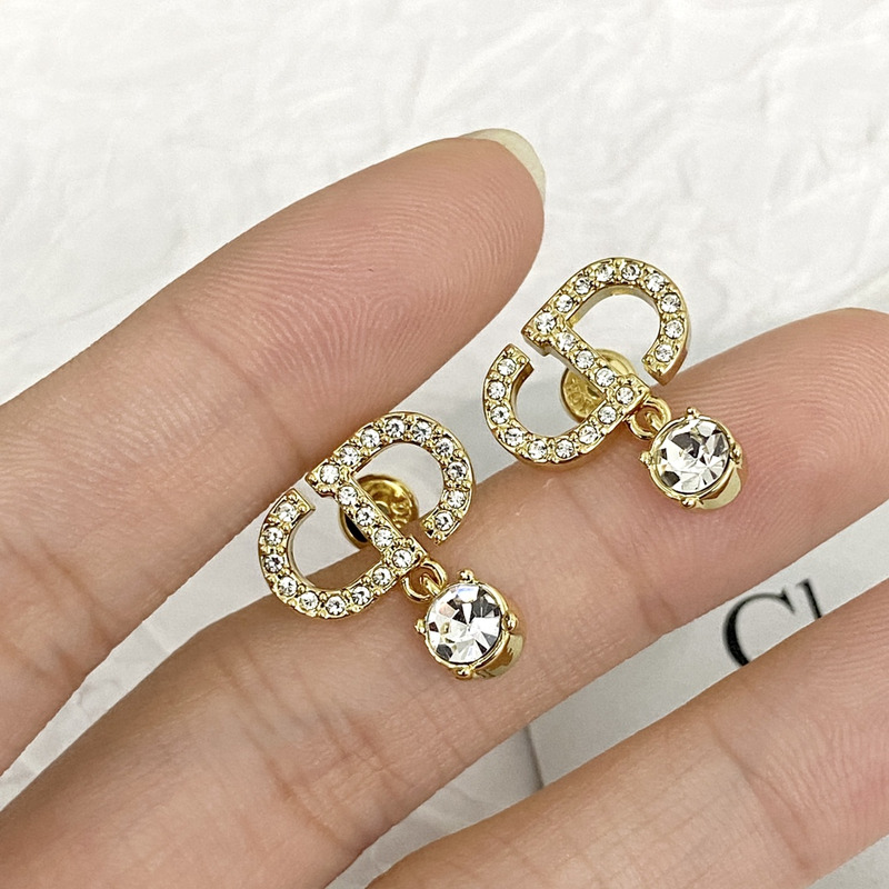 D*or gold-finish metal and silver-tone crystals