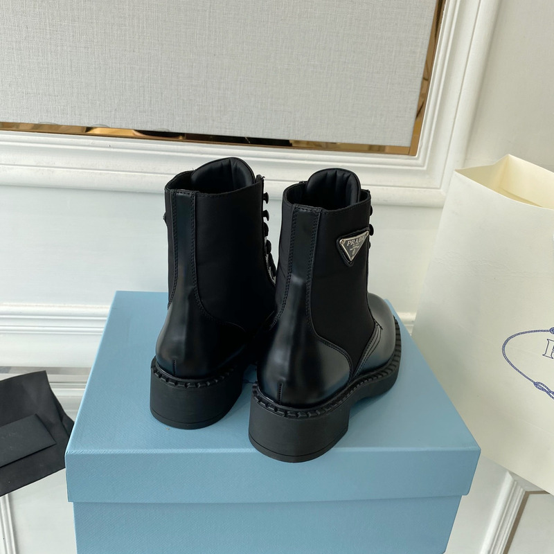 Pra*a brushed-leather and re-nylon boots black